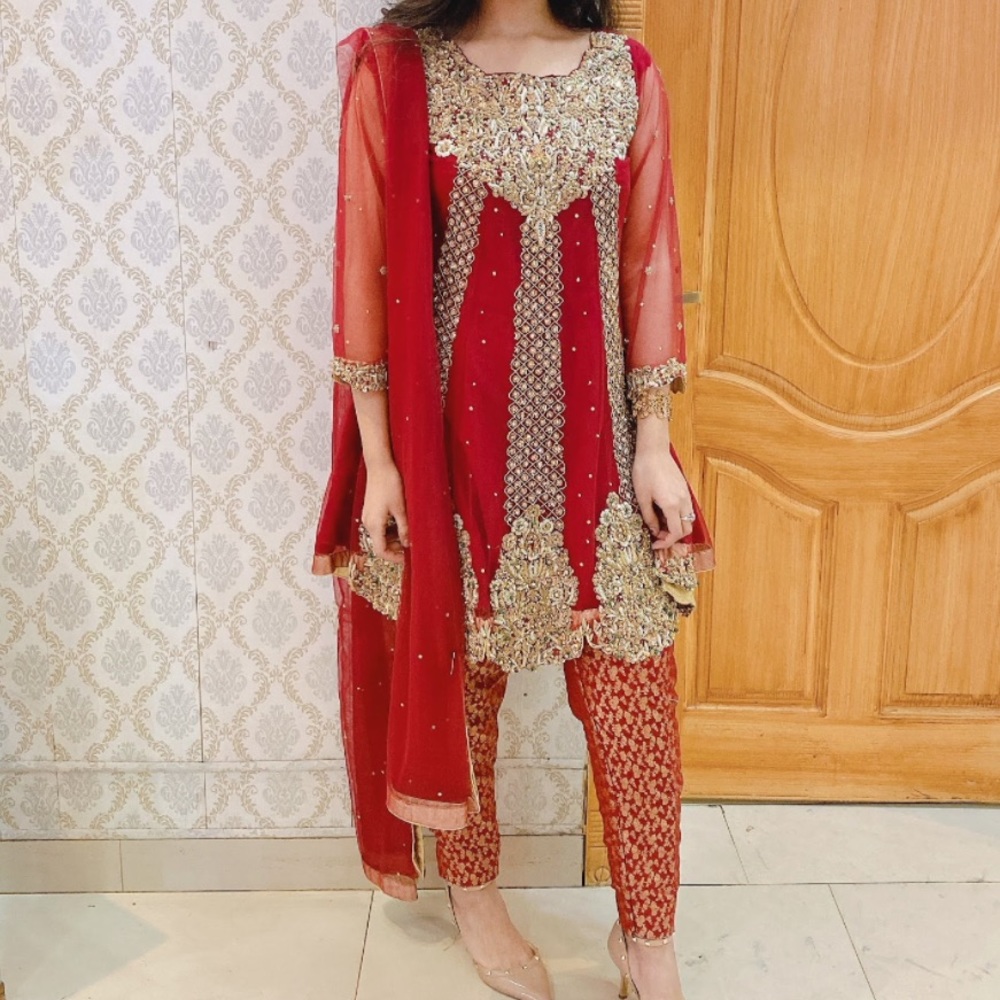 Red nomi ansari suit